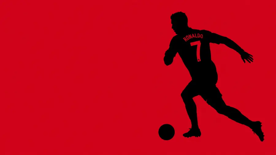 Black Silhouette of Cristiano Ronaldo Dribbling a Football Against a Red Background 4K wallpaper for desktop and mobile - Pixbee