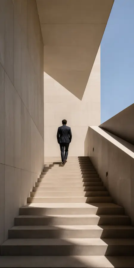 Businessman Walking Up Minimalist Modern Concrete Staircase 4K wallpaper for desktop and mobile - Pixbee