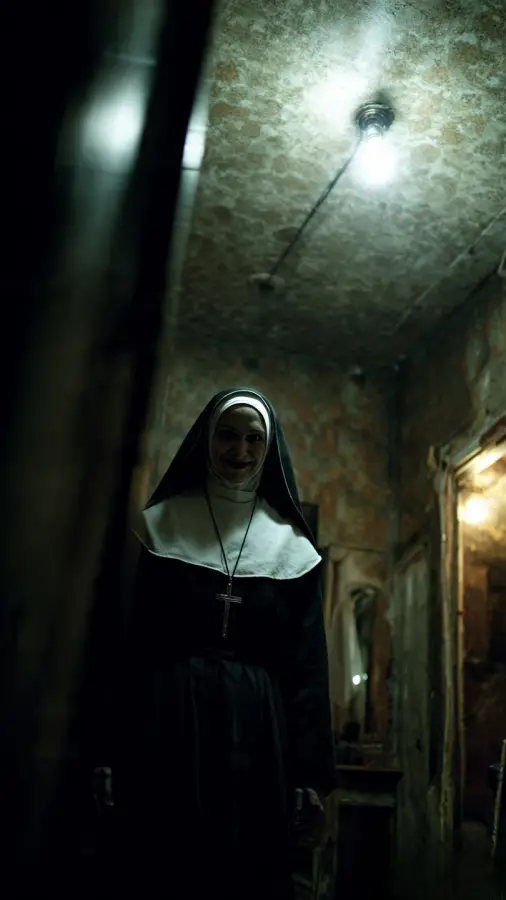 Creepy Nun In Dark Hallway 4K wallpaper for desktop and mobile - Pixbee