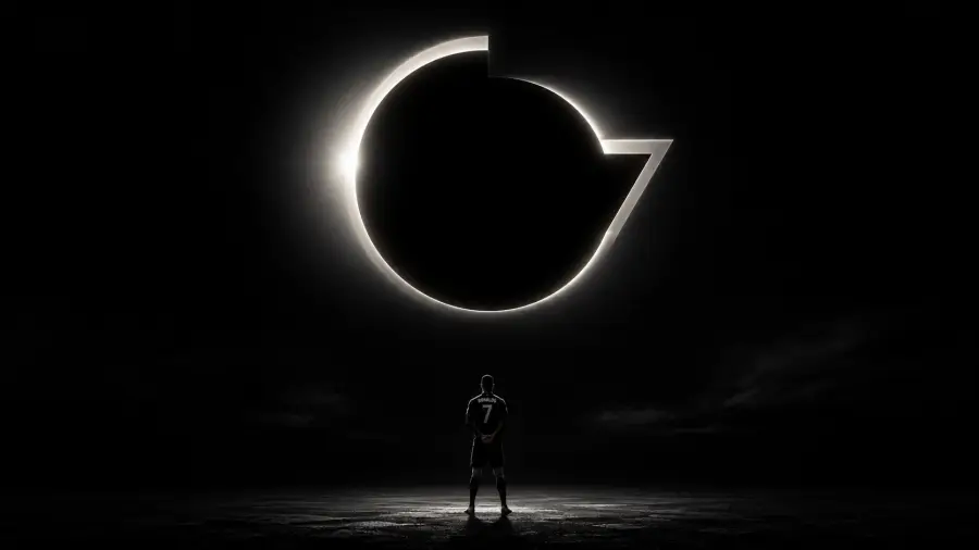 Cristiano Ronaldo Facing a Glowing Solar Eclipse Forming a G Logo 4K wallpaper for desktop and mobile - Pixbee