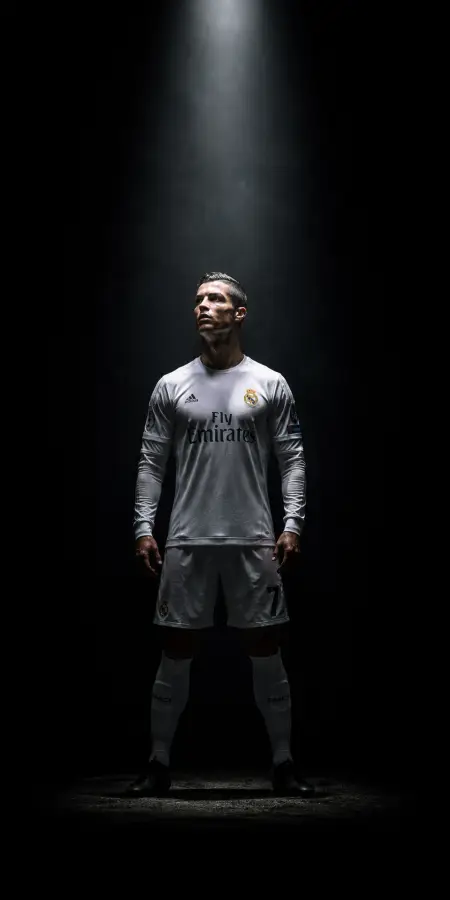 Cristiano Ronaldo Standing in Spotlight Beam 4K wallpaper for desktop and mobile - Pixbee