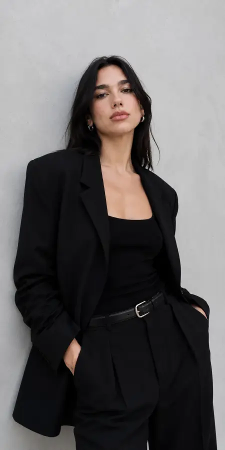 Dua Lipa in Chic Black Suit 4K wallpaper for desktop and mobile - Pixbee