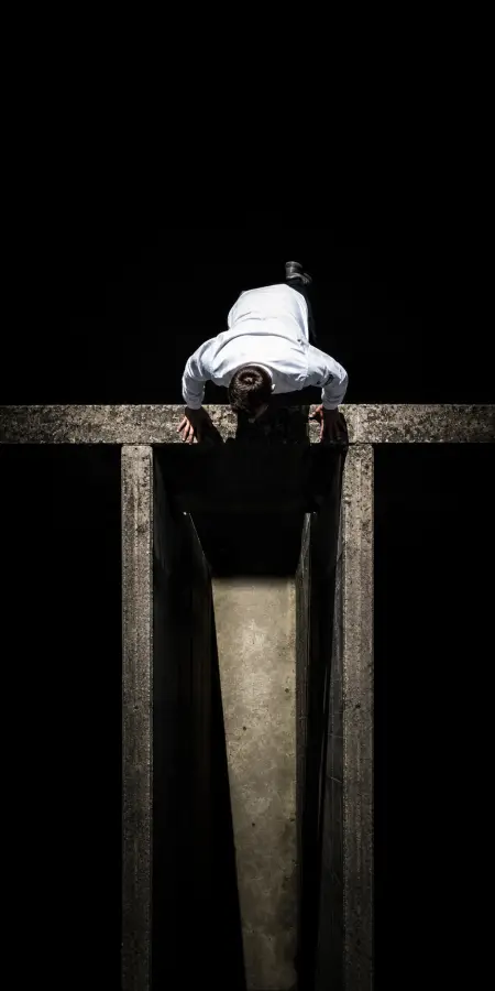 Man Doing Push Ups Above High Gap — ue5 phone wallpaper