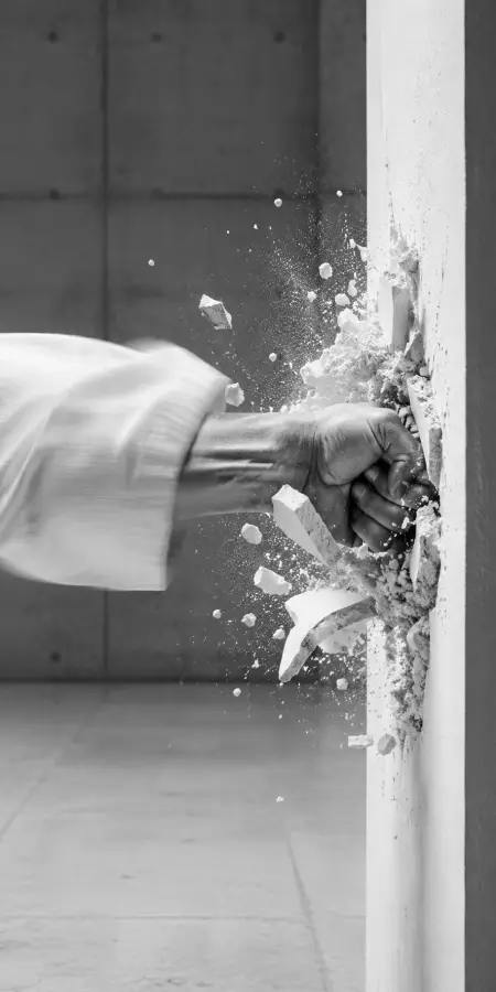 Martial Artist Punching Through Stone Wall — ue5 phone wallpaper