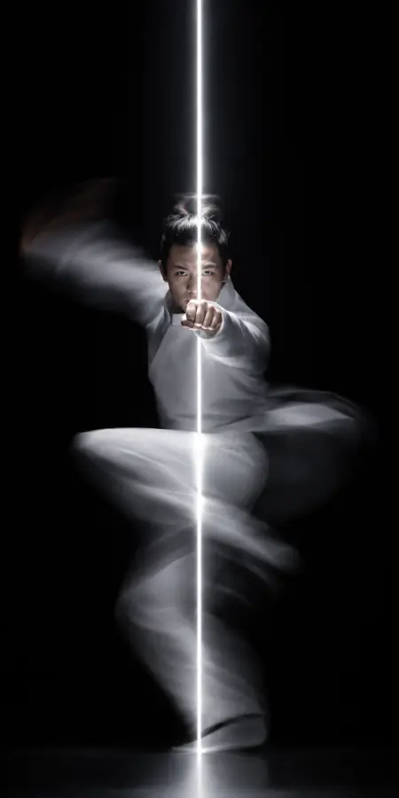 Martial Artist Striking Through Glowing Light Beam — ue5 phone wallpaper