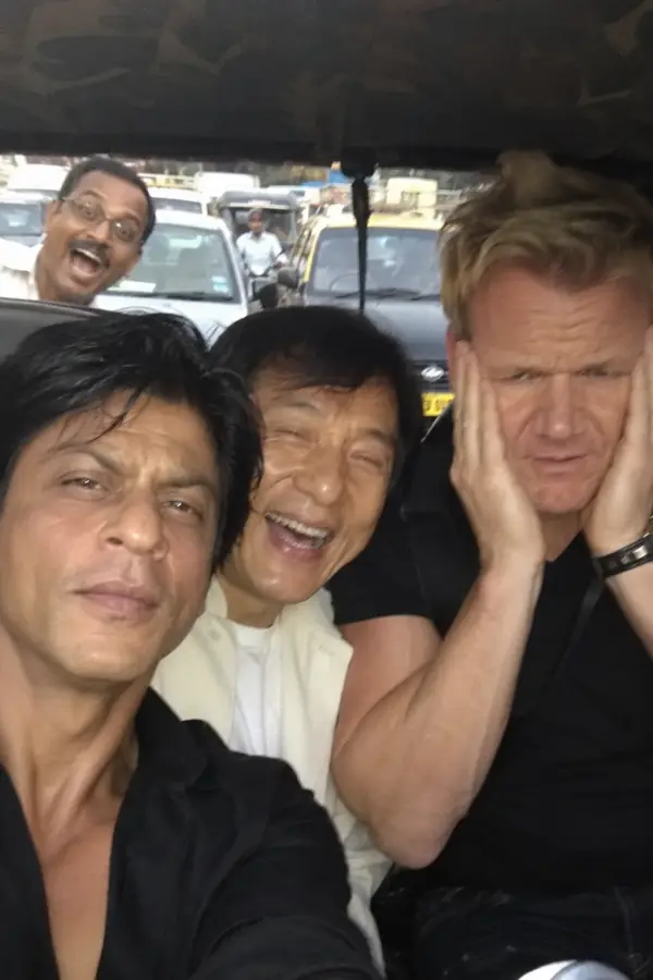 “Shah Rukh Khan vibing, Jackie Chan laughing, Gordon Ramsay regretting every life decision… and that uncle in the back living his best cameo life.” 4K wallpaper for desktop and mobile - Pixbee