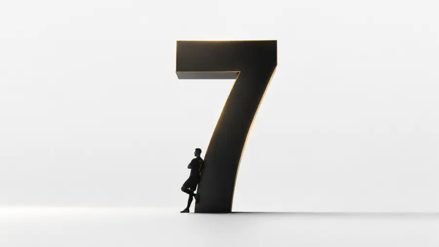 Silhouette of Cristiano Ronaldo Leaning on a Giant Number Seven 4K wallpaper for desktop and mobile - Pixbee