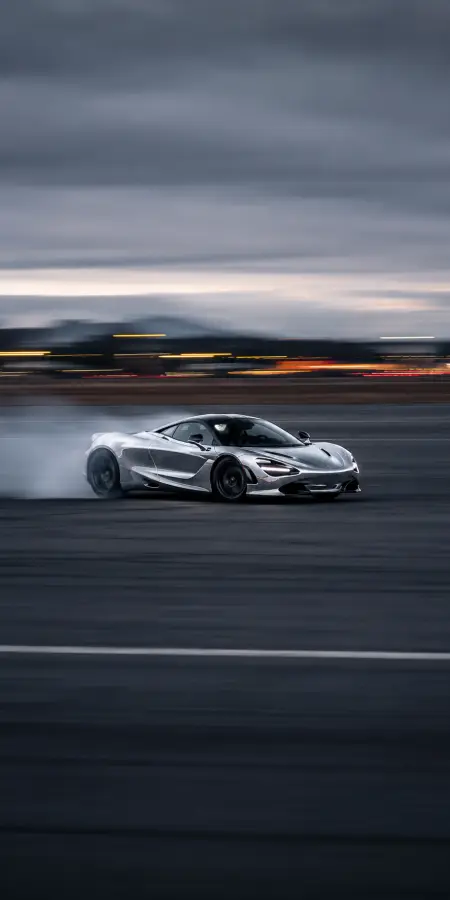 Silver Mclaren Supercar Drifting On Track — cars phone wallpaper