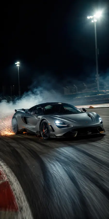 “Smoke behind me, victory ahead of me. 🏎️💨” 4K wallpaper for desktop and mobile - Pixbee