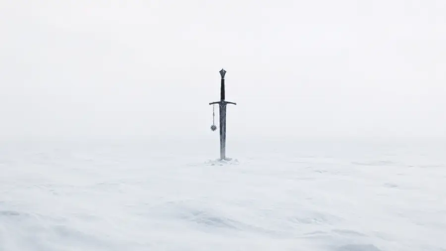 Solitary Knight Sword in Vast Frozen Tundra 4K wallpaper for desktop and mobile - Pixbee