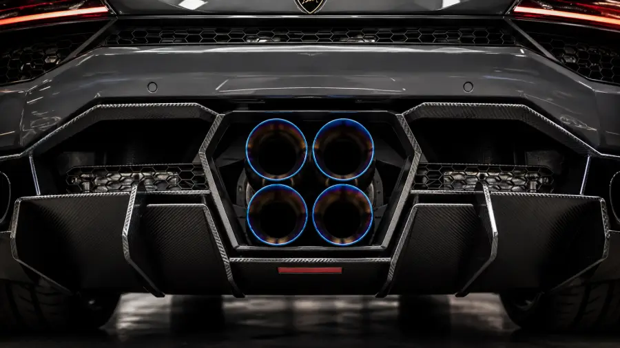 Symmetrical Rear View Detail of Hexagonal Centered Quad Exhaust on Grey Lamborghini 4K wallpaper for desktop and mobile - Pixbee
